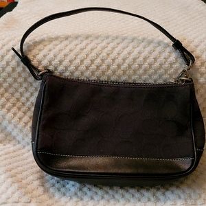 Mini black Coach handbag